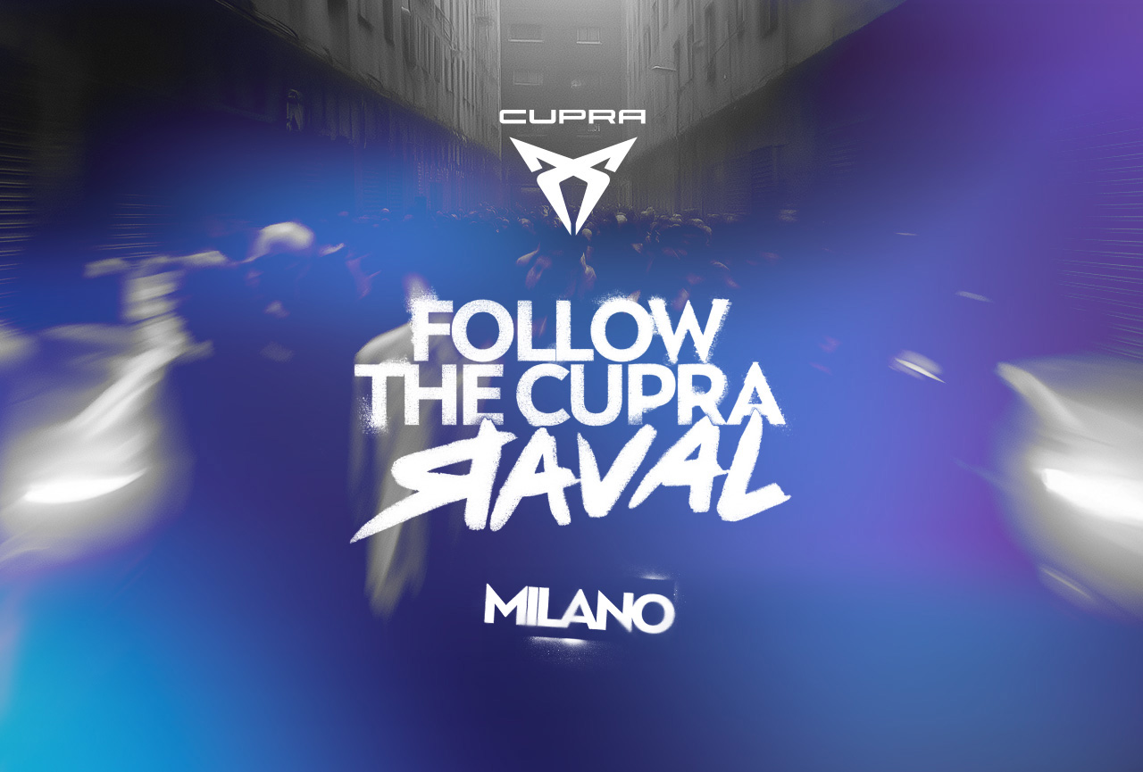 The CUPRA Raval, covered in a brown and white street map camouflage wrap, is displayed indoors. Behind the car is a chain-link fence panel with a glowing white CUPRA logo and the text "BEYOND REBEL, RAVAL.".